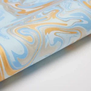 Papel de regalo marmolado azul claro