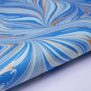 Papel de regalo marmolado azul olas del mar