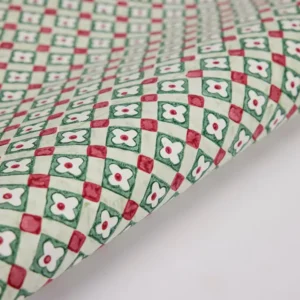 Papel de regalo artesanal grabado a mano con diseño de cuadros florales navidad de Jabón y Papel.